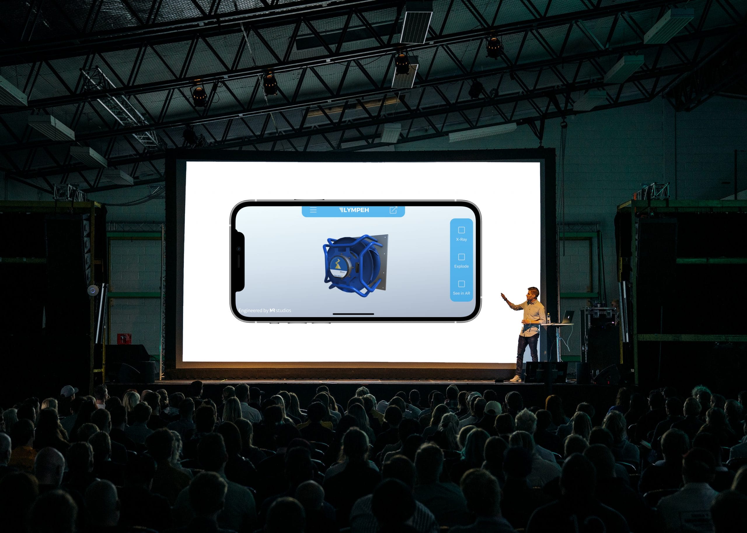 keynote speech with a smartphone screen that shows a zeihl abegg fan