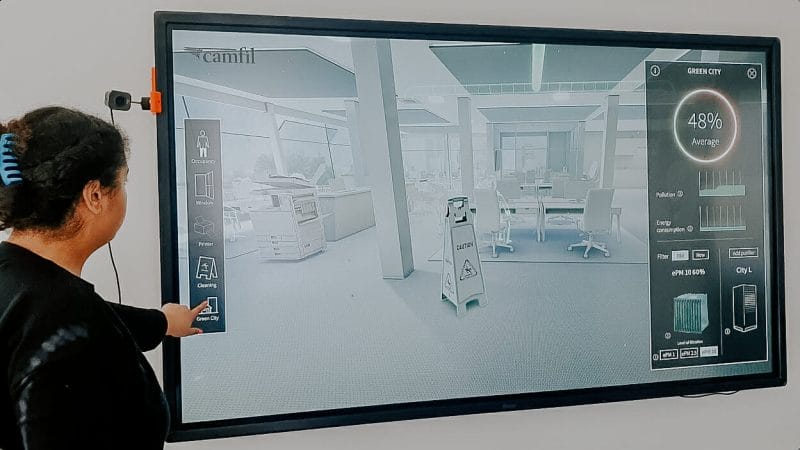 Camfil's dynamic room VR application in use on large touchscreen